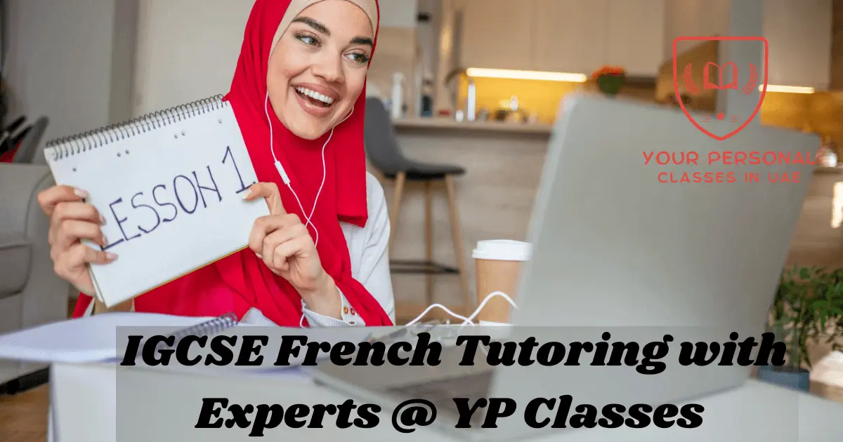 A girl in hijab using computer to take IGCSE French lesson